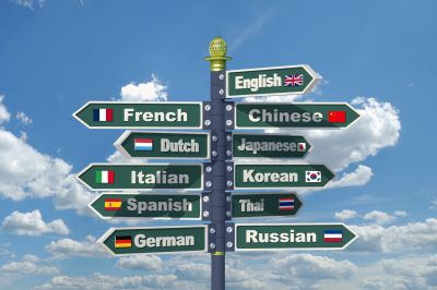 Languages Signpost Including English, French, Chinese, Dutch, Japanese, Italian, Korean, Spanish, Thai, German And Russian - W1