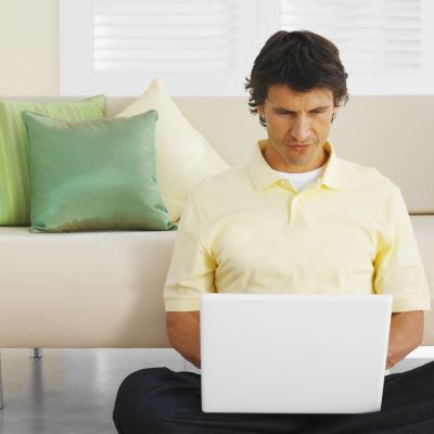 Portrait Of A Mid Adult Man Using A Laptop 2