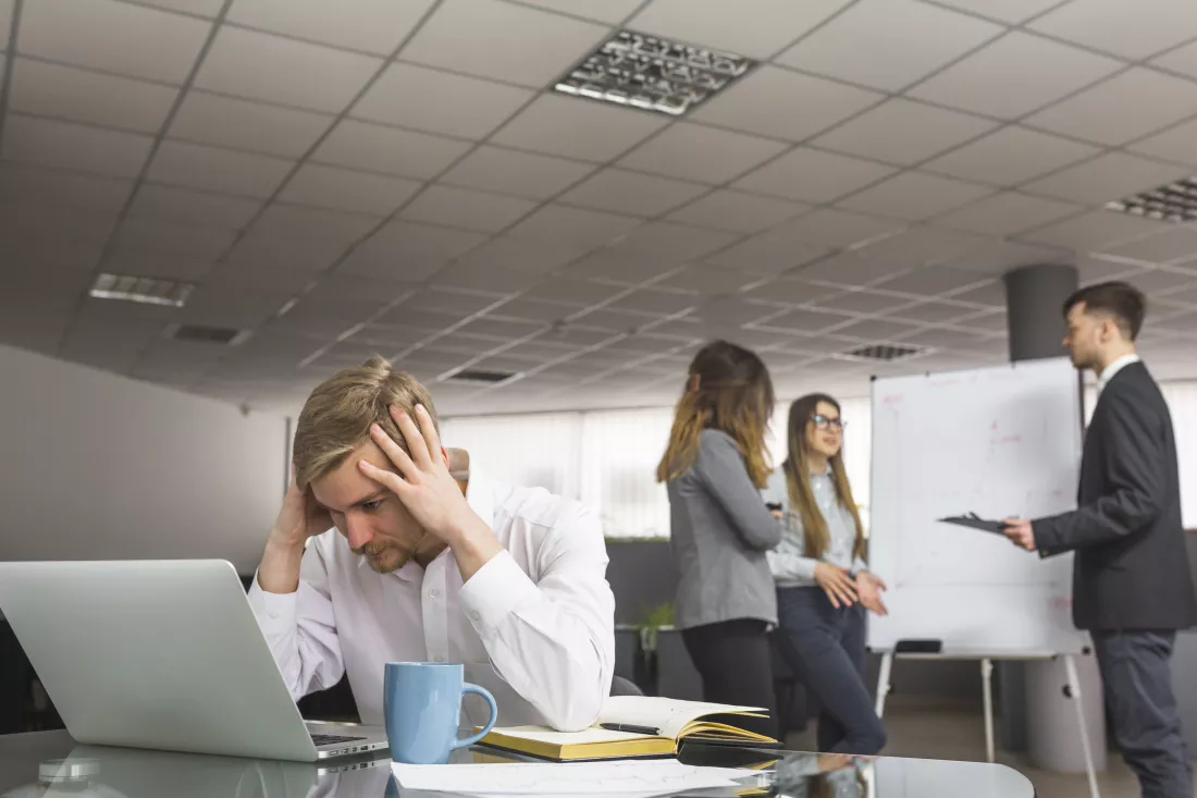 stressed-businessman-sitting-office