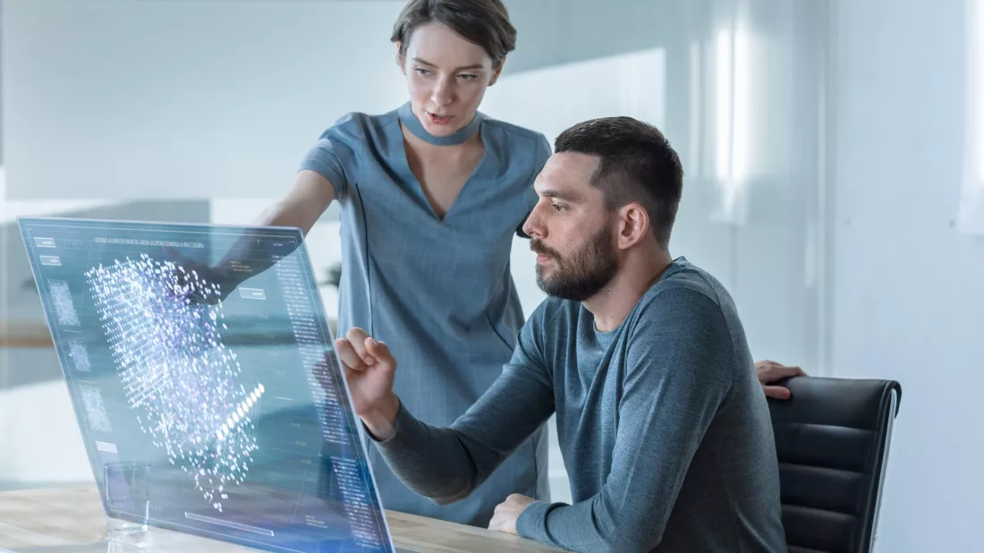 man-woman-looking-computer-screen-with-blue-background-man-looking-it